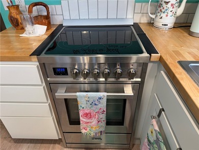 2 bedroom 1 bath with covered deck and parking. Newly remodeled on Riverview Golf Course in Arizona - for sale on GolfHomes.com, golf home, golf lot