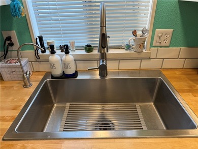 2 bedroom 1 bath with covered deck and parking. Newly remodeled on Riverview Golf Course in Arizona - for sale on GolfHomes.com, golf home, golf lot