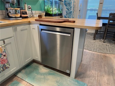 2 bedroom 1 bath with covered deck and parking. Newly remodeled on Riverview Golf Course in Arizona - for sale on GolfHomes.com, golf home, golf lot