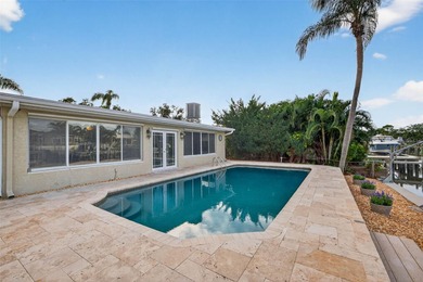 ~~WATERFRONT POOL HOME~~Discover the perfect blend of coastal on Mangrove Bay Golf Course in Florida - for sale on GolfHomes.com, golf home, golf lot