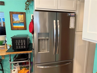 2 bedroom 1 bath with covered deck and parking. Newly remodeled on Riverview Golf Course in Arizona - for sale on GolfHomes.com, golf home, golf lot