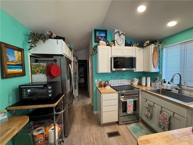 2 bedroom 1 bath with covered deck and parking. Newly remodeled on Riverview Golf Course in Arizona - for sale on GolfHomes.com, golf home, golf lot