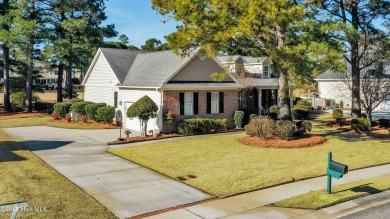 One level home situated on a lot backing to the golf course and on Magnolia Greens Golf Plantation in North Carolina - for sale on GolfHomes.com, golf home, golf lot