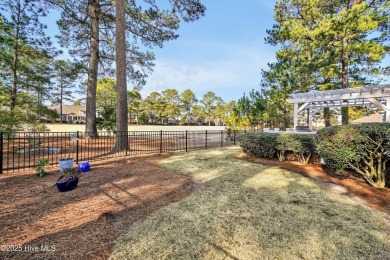 One level home situated on a lot backing to the golf course and on Magnolia Greens Golf Plantation in North Carolina - for sale on GolfHomes.com, golf home, golf lot