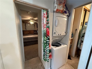 2 bedroom 1 bath with covered deck and parking. Newly remodeled on Riverview Golf Course in Arizona - for sale on GolfHomes.com, golf home, golf lot