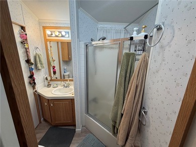 2 bedroom 1 bath with covered deck and parking. Newly remodeled on Riverview Golf Course in Arizona - for sale on GolfHomes.com, golf home, golf lot