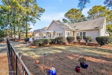 One level home situated on a lot backing to the golf course and on Magnolia Greens Golf Plantation in North Carolina - for sale on GolfHomes.com, golf home, golf lot