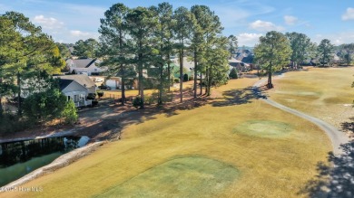 One level home situated on a lot backing to the golf course and on Magnolia Greens Golf Plantation in North Carolina - for sale on GolfHomes.com, golf home, golf lot