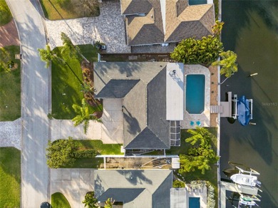 ~~WATERFRONT POOL HOME~~Discover the perfect blend of coastal on Mangrove Bay Golf Course in Florida - for sale on GolfHomes.com, golf home, golf lot