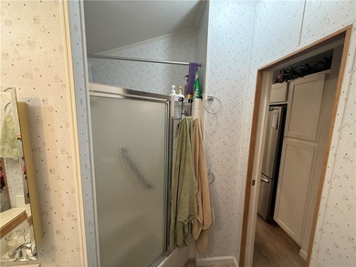 2 bedroom 1 bath with covered deck and parking. Newly remodeled on Riverview Golf Course in Arizona - for sale on GolfHomes.com, golf home, golf lot