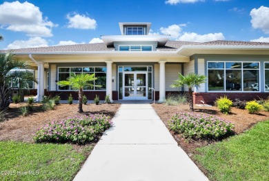 One level home situated on a lot backing to the golf course and on Magnolia Greens Golf Plantation in North Carolina - for sale on GolfHomes.com, golf home, golf lot