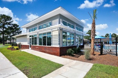 One level home situated on a lot backing to the golf course and on Magnolia Greens Golf Plantation in North Carolina - for sale on GolfHomes.com, golf home, golf lot