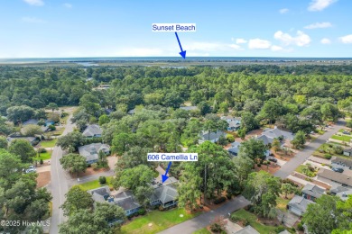 Welcome to 606 Camellia Lane, located in the amenity-rich on Sea Trail Golf Resort in North Carolina - for sale on GolfHomes.com, golf home, golf lot
