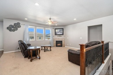 With new carpet on the main floor and fresh front yard on Harmony Golf Club in Colorado - for sale on GolfHomes.com, golf home, golf lot