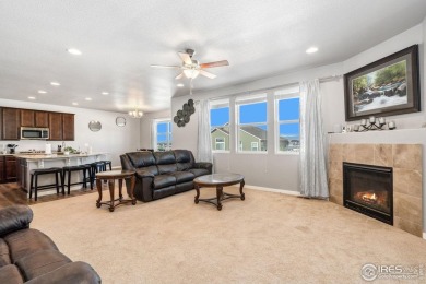 With new carpet on the main floor and fresh front yard on Harmony Golf Club in Colorado - for sale on GolfHomes.com, golf home, golf lot