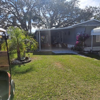 NEW LOW PRICE!!  GREAT VALUE!!  Located in an all age RV resort on Southport Springs Golf Club in Florida - for sale on GolfHomes.com, golf home, golf lot