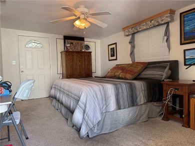 2 bedroom 1 bath with covered deck and parking. Newly remodeled on Riverview Golf Course in Arizona - for sale on GolfHomes.com, golf home, golf lot