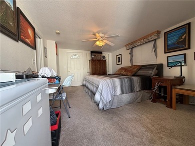 2 bedroom 1 bath with covered deck and parking. Newly remodeled on Riverview Golf Course in Arizona - for sale on GolfHomes.com, golf home, golf lot