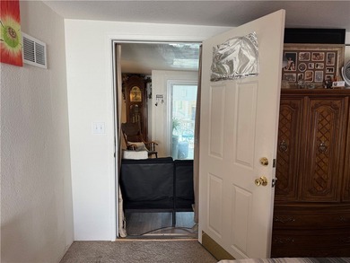 2 bedroom 1 bath with covered deck and parking. Newly remodeled on Riverview Golf Course in Arizona - for sale on GolfHomes.com, golf home, golf lot