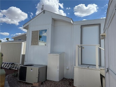 2 bedroom 1 bath with covered deck and parking. Newly remodeled on Riverview Golf Course in Arizona - for sale on GolfHomes.com, golf home, golf lot