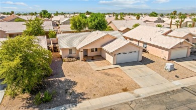 Inviting 3-Bedroom Home in Fairway Estates with Resort-Style on Desert Lakes Golf Course in Arizona - for sale on GolfHomes.com, golf home, golf lot