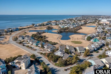 Location, location, location! Nestled in a cul-de-sac in The on Nags Head Golf Links in North Carolina - for sale on GolfHomes.com, golf home, golf lot