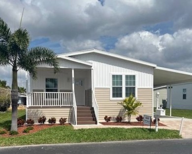 TOTALLY MODERN & OPEN DESIGN WITH HIGH CEILINGS AND PERFECT on Royal Wood Golf and Country Club in Florida - for sale on GolfHomes.com, golf home, golf lot