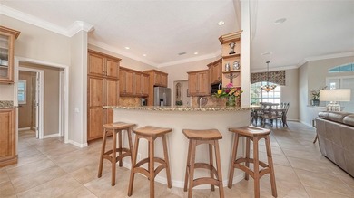 Welcome to this beautiful Siesta home with lake views, where on Pelican Pointe Golf and Country Club in Florida - for sale on GolfHomes.com, golf home, golf lot