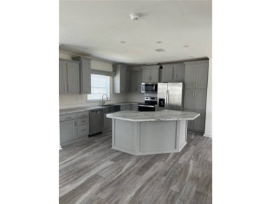 TOTALLY MODERN & OPEN DESIGN WITH HIGH CEILINGS AND PERFECT on Royal Wood Golf and Country Club in Florida - for sale on GolfHomes.com, golf home, golf lot