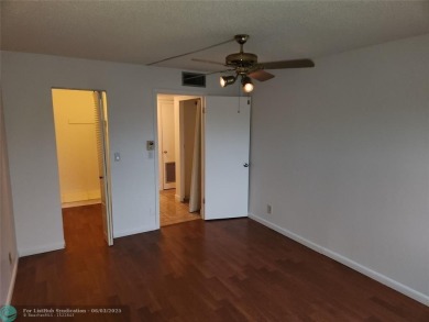 55+ COMMUNITY, UNIT IS ON THE 2nd FLOOR, WELL KEPT BUILDING #120 on Sunrise Lakes Phase III in Florida - for sale on GolfHomes.com, golf home, golf lot