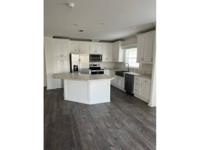 TOTALLY MODERN & OPEN DESIGN WITH HIGH CEILINGS AND PERFECT on Royal Wood Golf and Country Club in Florida - for sale on GolfHomes.com, golf home, golf lot