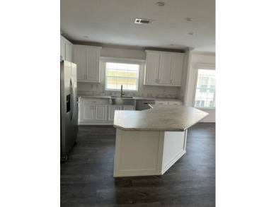 TOTALLY MODERN & OPEN DESIGN WITH HIGH CEILINGS AND PERFECT on Royal Wood Golf and Country Club in Florida - for sale on GolfHomes.com, golf home, golf lot