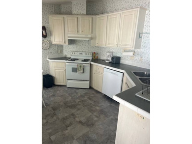 Well-priced, spacious home in a beautiful setting at The on Hamptons Golf Club in Florida - for sale on GolfHomes.com, golf home, golf lot