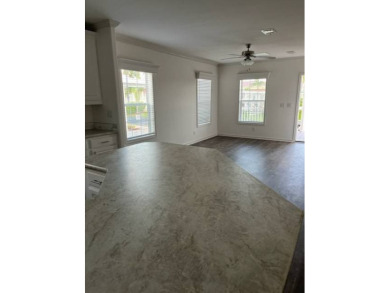 TOTALLY MODERN & OPEN DESIGN WITH HIGH CEILINGS AND PERFECT on Royal Wood Golf and Country Club in Florida - for sale on GolfHomes.com, golf home, golf lot