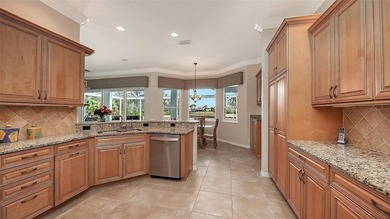 Welcome to this beautiful Siesta home with lake views, where on Pelican Pointe Golf and Country Club in Florida - for sale on GolfHomes.com, golf home, golf lot