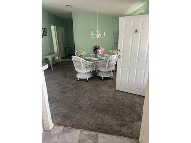 Well-priced, spacious home in a beautiful setting at The on Hamptons Golf Club in Florida - for sale on GolfHomes.com, golf home, golf lot