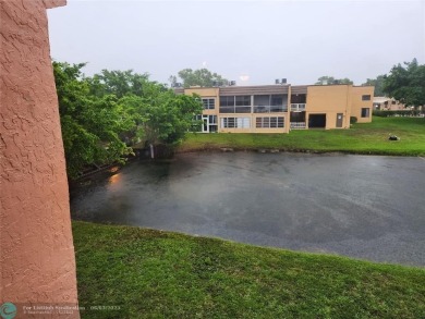 55+ COMMUNITY, UNIT IS ON THE 2nd FLOOR, WELL KEPT BUILDING #120 on Sunrise Lakes Phase III in Florida - for sale on GolfHomes.com, golf home, golf lot