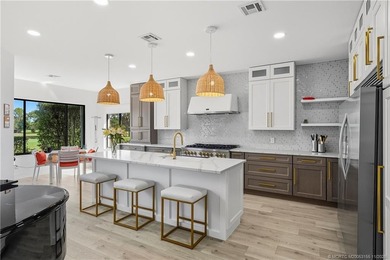 Beautifully updated 4BR/3.5BA CBS home on 1 acre in the gated on Evergreen Club in Florida - for sale on GolfHomes.com, golf home, golf lot