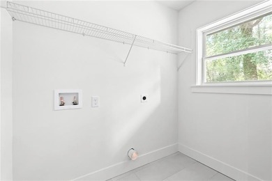 Welcome to your  Charming Ranch Dream Home where Elegance meets on East Lake Golf Club in Georgia - for sale on GolfHomes.com, golf home, golf lot