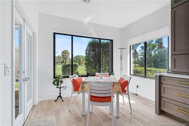 Beautifully updated 4BR/3.5BA CBS home on 1 acre in the gated on Evergreen Club in Florida - for sale on GolfHomes.com, golf home, golf lot