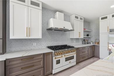 Beautifully updated 4BR/3.5BA CBS home on 1 acre in the gated on Evergreen Club in Florida - for sale on GolfHomes.com, golf home, golf lot