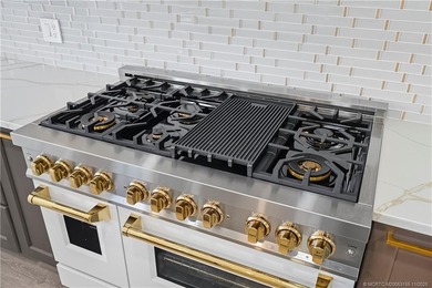 Beautifully updated 4BR/3.5BA CBS home on 1 acre in the gated on Evergreen Club in Florida - for sale on GolfHomes.com, golf home, golf lot