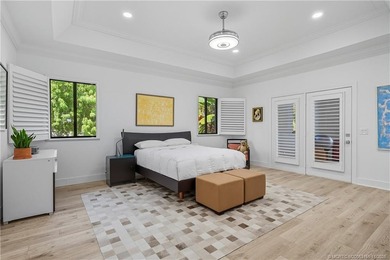 Beautifully updated 4BR/3.5BA CBS home on 1 acre in the gated on Evergreen Club in Florida - for sale on GolfHomes.com, golf home, golf lot