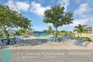 55+ COMMUNITY, UNIT IS ON THE 2nd FLOOR, WELL KEPT BUILDING #120 on Sunrise Lakes Phase III in Florida - for sale on GolfHomes.com, golf home, golf lot