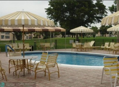 55+ COMMUNITY, UNIT IS ON THE 2nd FLOOR, WELL KEPT BUILDING #120 on Sunrise Lakes Phase III in Florida - for sale on GolfHomes.com, golf home, golf lot
