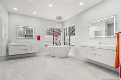 Beautifully updated 4BR/3.5BA CBS home on 1 acre in the gated on Evergreen Club in Florida - for sale on GolfHomes.com, golf home, golf lot