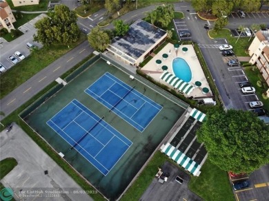 55+ COMMUNITY, UNIT IS ON THE 2nd FLOOR, WELL KEPT BUILDING #120 on Sunrise Lakes Phase III in Florida - for sale on GolfHomes.com, golf home, golf lot