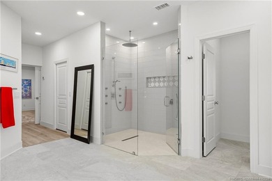 Beautifully updated 4BR/3.5BA CBS home on 1 acre in the gated on Evergreen Club in Florida - for sale on GolfHomes.com, golf home, golf lot