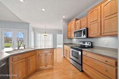 Discover comfort, style, and scenic golf-front living in this on Deer Creek Golf Club in Tennessee - for sale on GolfHomes.com, golf home, golf lot