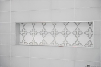 Beautifully updated 4BR/3.5BA CBS home on 1 acre in the gated on Evergreen Club in Florida - for sale on GolfHomes.com, golf home, golf lot